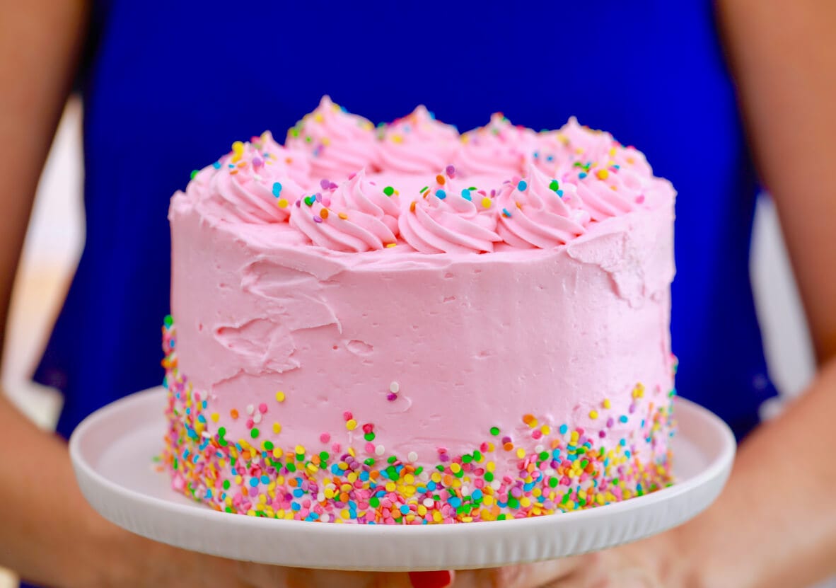 Costco selling giant donut cake with frosting and sprinkles